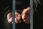 A_person_in_arrest_behind_bars.jpg