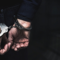 Image of a person in handcuffs