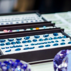 Blue gems on display in a case