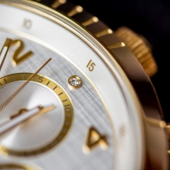 Classic_gold_chronograph_wrist_watch_closeup.jpg