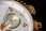 Classic_gold_chronograph_wrist_watch_closeup.jpg