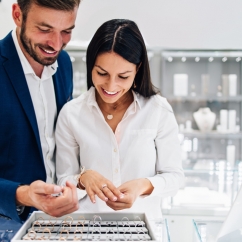 Couple_looking_at_rings_in_a_store.jpg