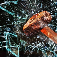 Glass_smashed_with_a_sledgehammer.jpg