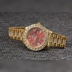 Gold_and_red_rolex_watch.jpg