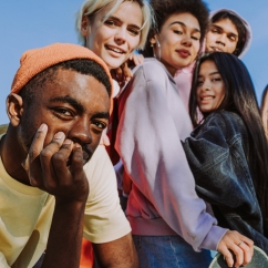 Multiracial group of young friends chilling