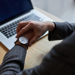 Working_on_a_laptop_with_a_watch_on.jpg